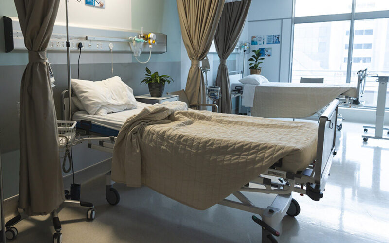 General View Of Patient Room With Beds.