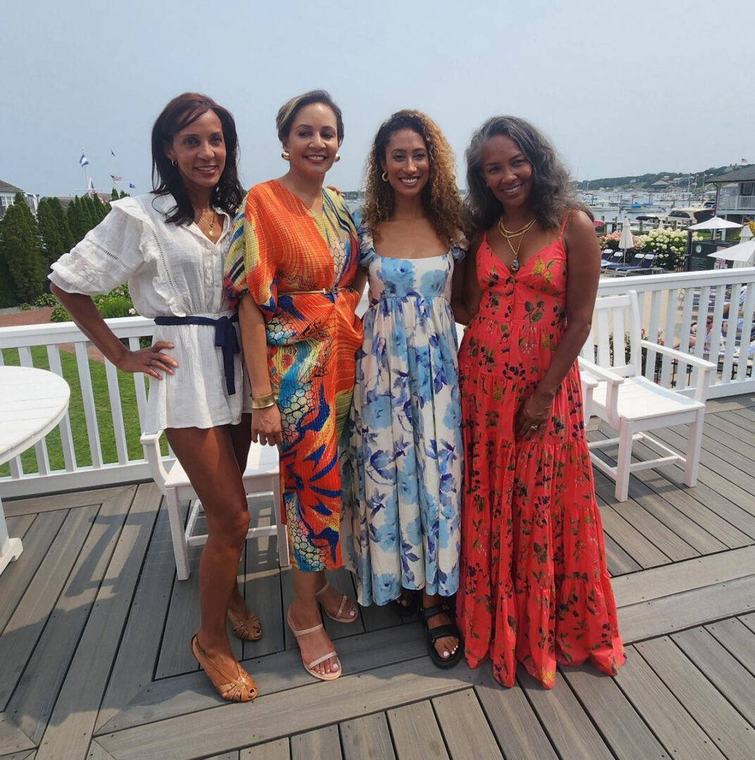 L–R: Maisha Closson, Regina Davis Moss, Elaine Welteroth, and Mara Brock Akil share a candid moment with the Vineyard breeze behind them.